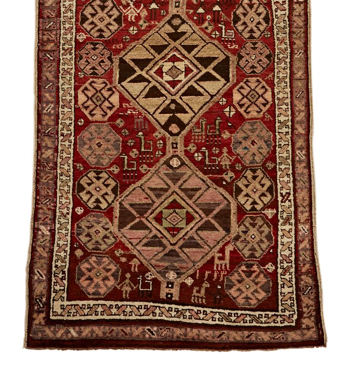 Turkish Rug in Reds and Natural Tones