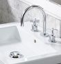 West Slope Short Spout Cross Handle Widespread Bathroom Faucet